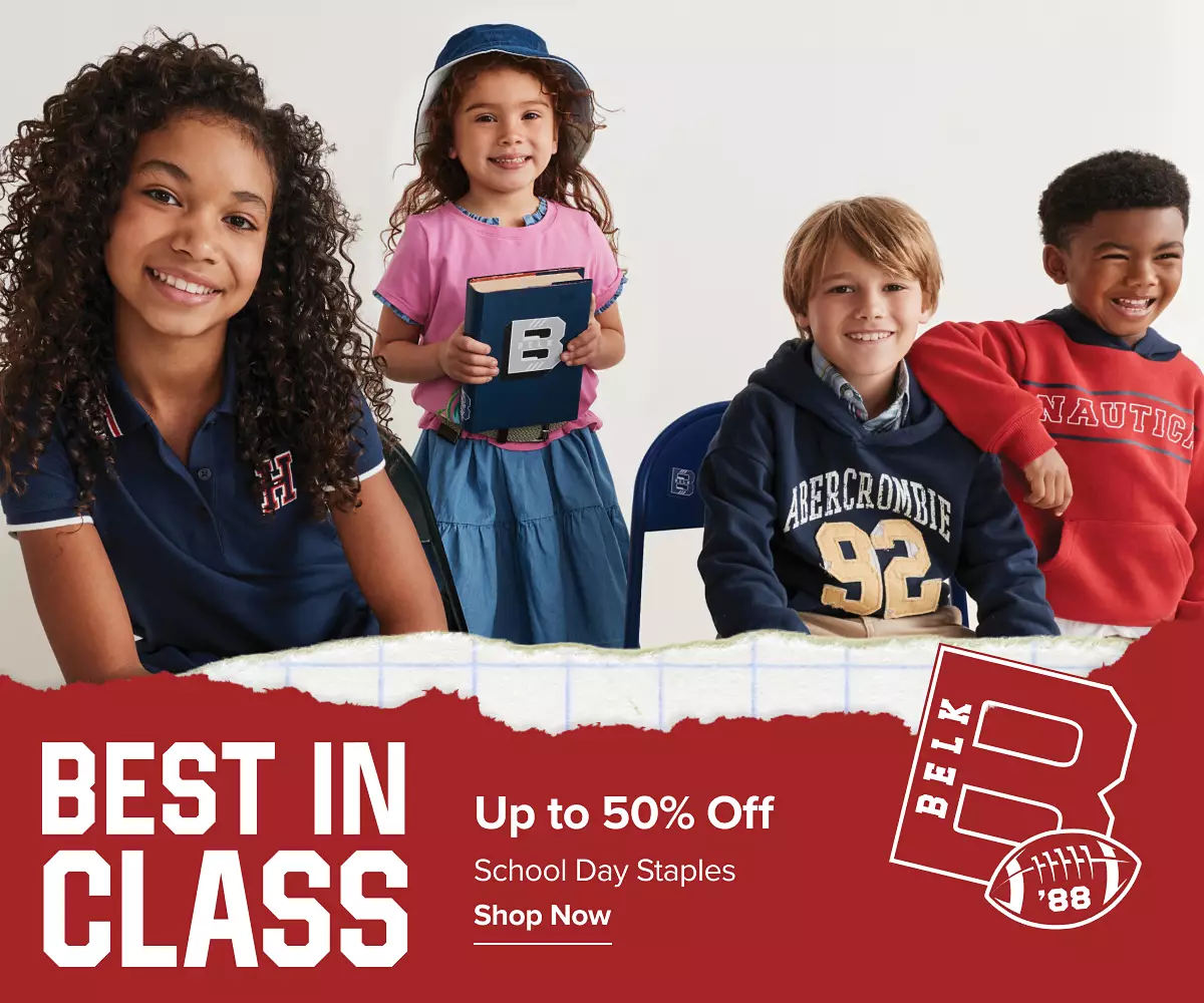 Best in class. Up to 50% off school day staples. Shop now. A group of children in school clothes ready for class.