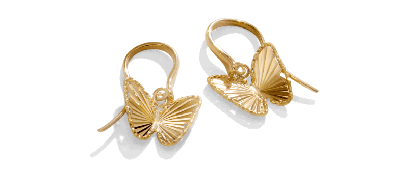 Gold butterfly drop earrings with etched wings and hook backs.