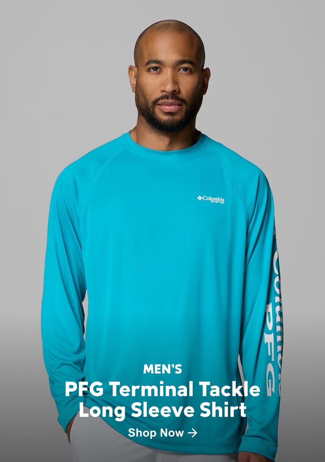 A man wearing a blue long sleeve shirt with text: Men's PFG Terminal Tackle Long Sleeve Shirt
