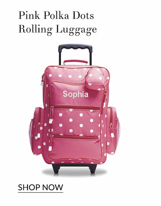 Pink polka dots rolling luggage