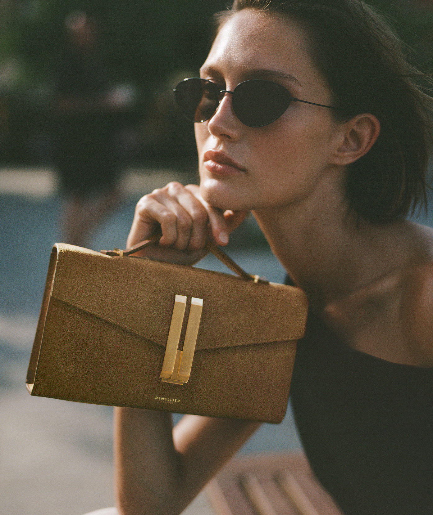 vancouver clutch in tobacco suede