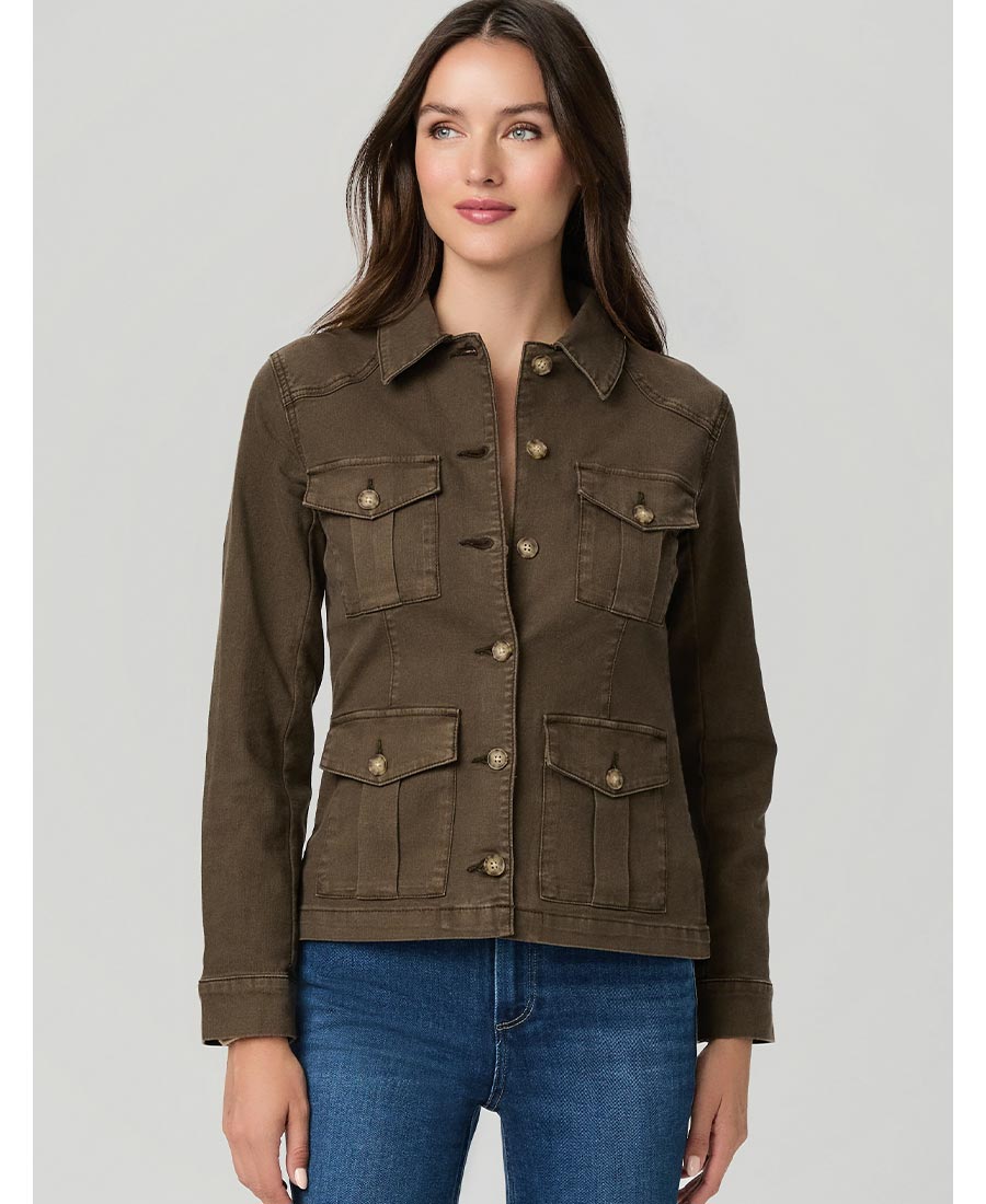 A woman wearing a dark green safari inspired jacket.