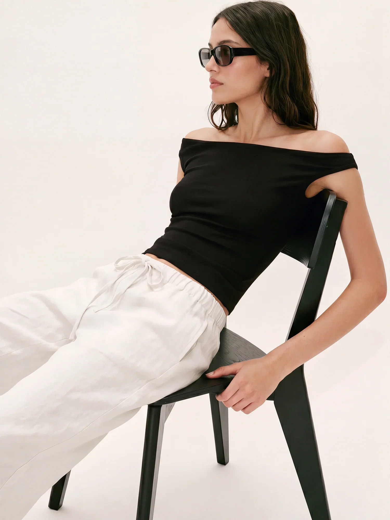 Image of Sleeveless Knit Draped Ruching Top