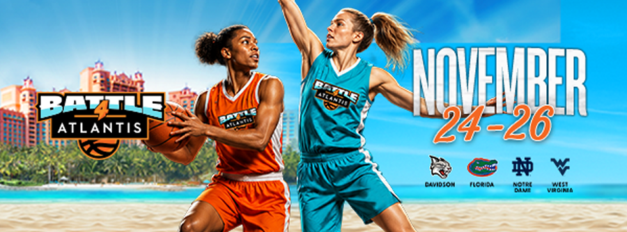 Battle 4 Atlantis. November 24-26. | Two women playing basketball on a court with the tropical Atlantis resort and beach in the background.
