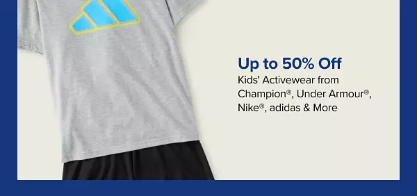 Up to 50% off kids activewear from Champion, Under Armour, Nike and Adidas. Shop now. A kids shirt with black shorts.