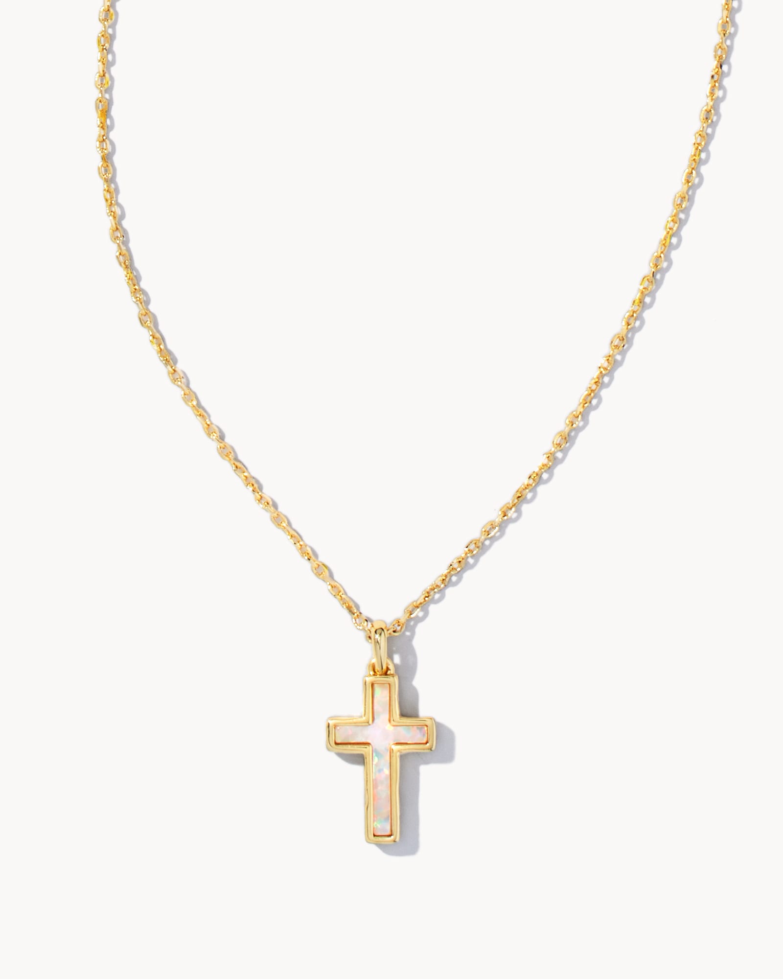 Image of Kendra Scott Cross Gold Pendant Necklace in White Lab Grown Opal | Kyocera Opal