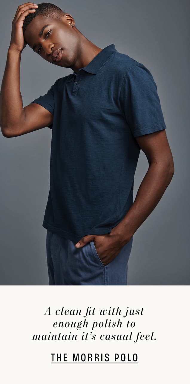 Image shows a model wearing the Morris Top in Midnight. Text reads: A clean fit with just enough polish to maintain it’s casual feel.