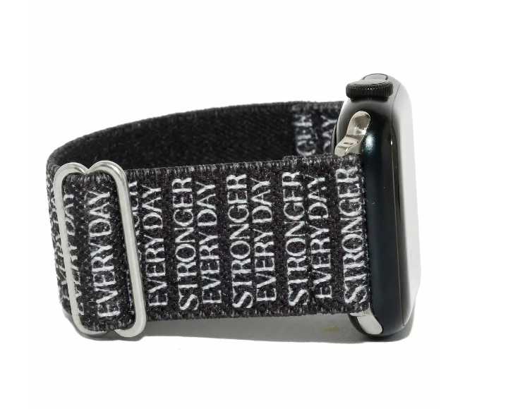 Close-up of the Strength Apple Watch band, black with "STRONGER EVERY DAY" text.