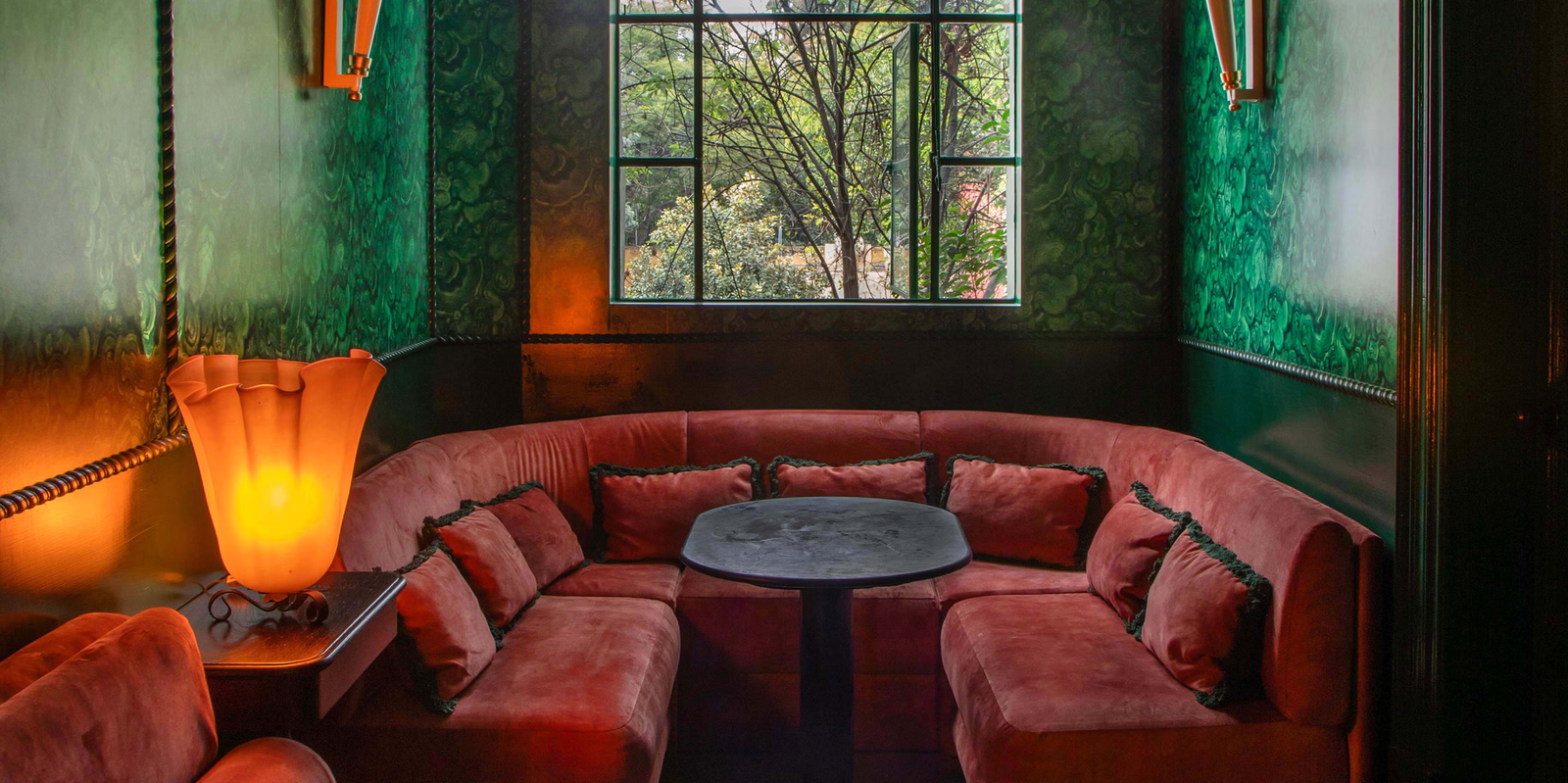 cozy seating area with large window and decorative elements