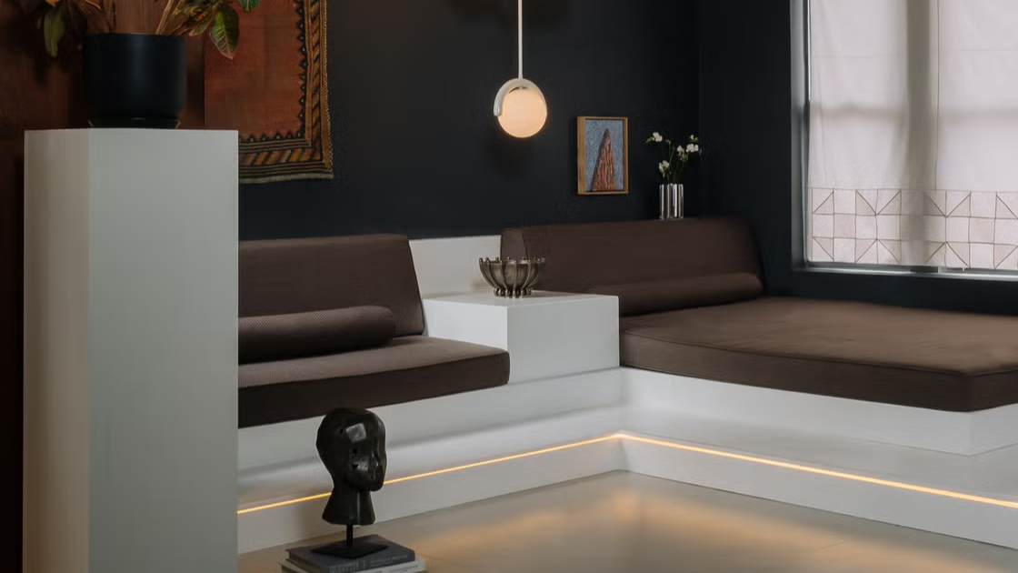 modern living space featuring stylish furniture and lighting