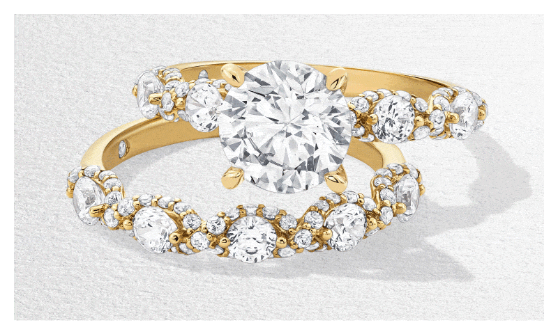 GIF featuring a variety of Emmy London white gold and yellow gold engagement rings in different cuts and shapes.