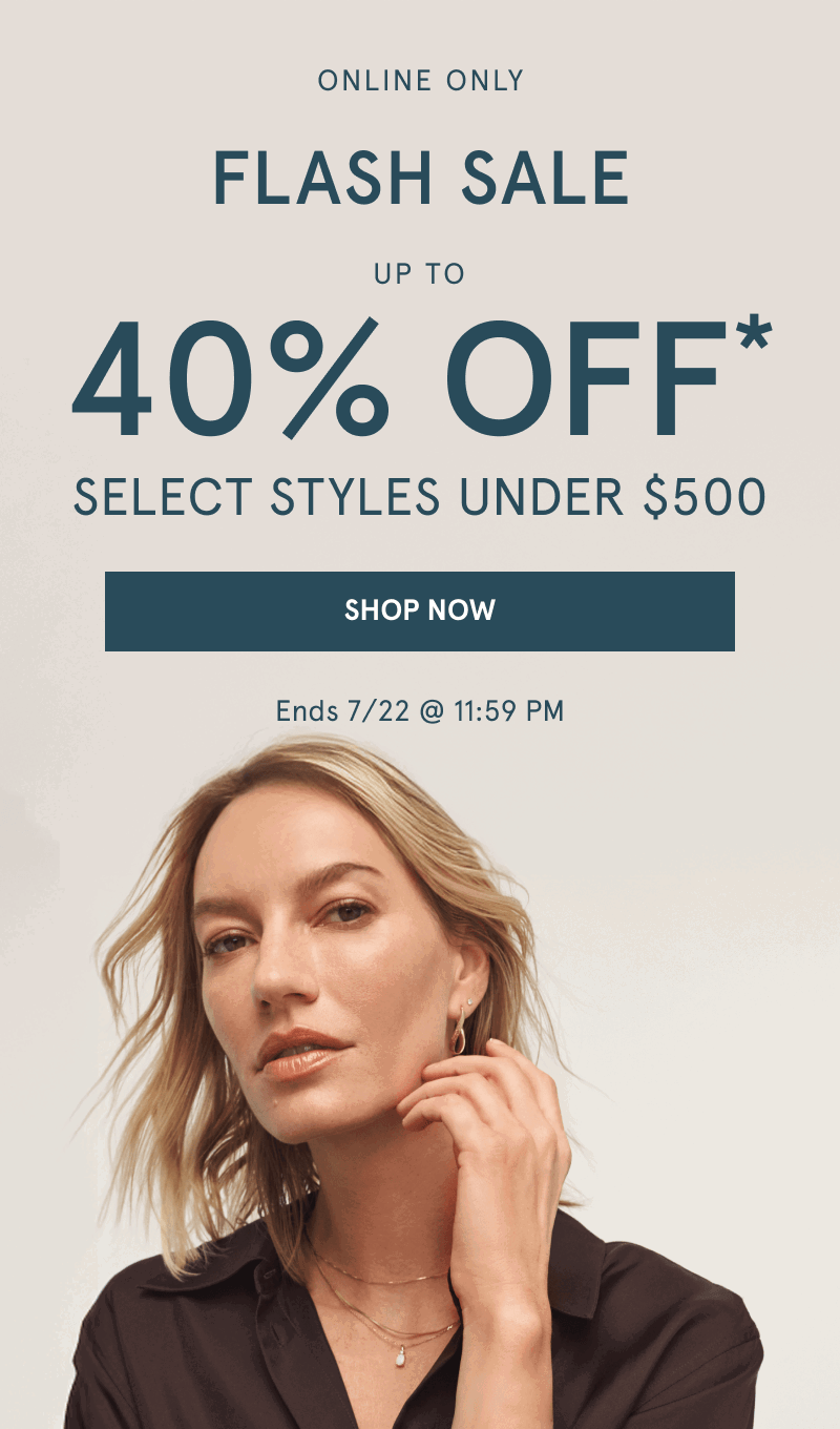 Woman wearing layered yellow gold chains and stacked earrings. Flash sale 30% Off select styles under $500. Click shop now.