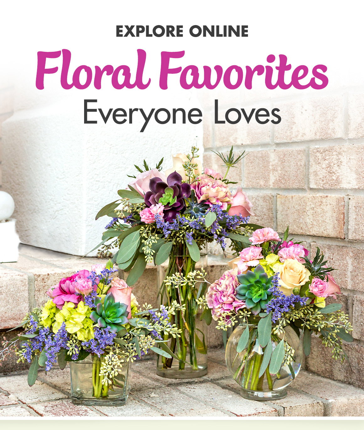 Floral Favorites Everyone Loves. Image of three bouquets of artificial flowers in clear vases on a terrace.