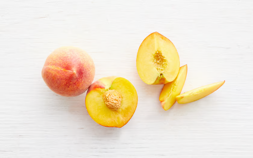 Organic O'Henry Yellow Peach Trio from Blossom Bluff Orchards, halved and whole