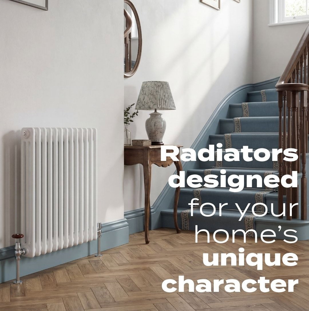 Traditional white column radiator in a bright hallway beside a staircase, promoting radiators designed to suit every home's character.
