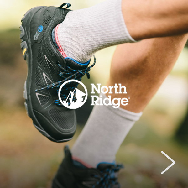 Close-up of a black North Ridge walking shoe worn with light-coloured hiking socks, highlighting the shoe’s rugged design and outdoor performance features.