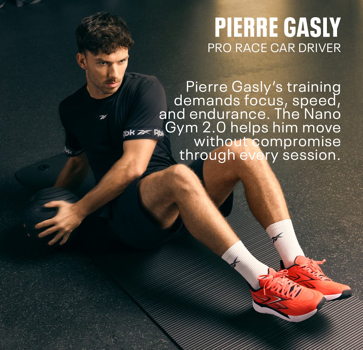 Pierre Gasly trains on a gym mat wearing Nano Gym 2.0 training shoes. Text reads: “PIERRE GASLY. PRO RACE CAR DRIVER. Pierre Gasly’s training demands focus, speed, and endurance. The Nano Gym 2.0 helps him move without compromise through every session.”