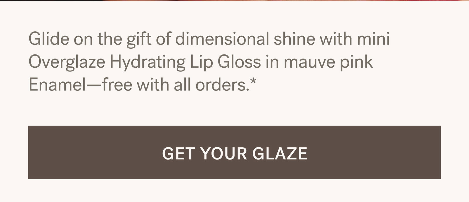 Glide on the gift of dimensional shine with mini Overglaze Hydrating Lip Gloss in mauve pink Enamel—free with all orders.*