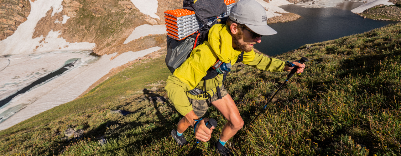 A hiker going up hill.