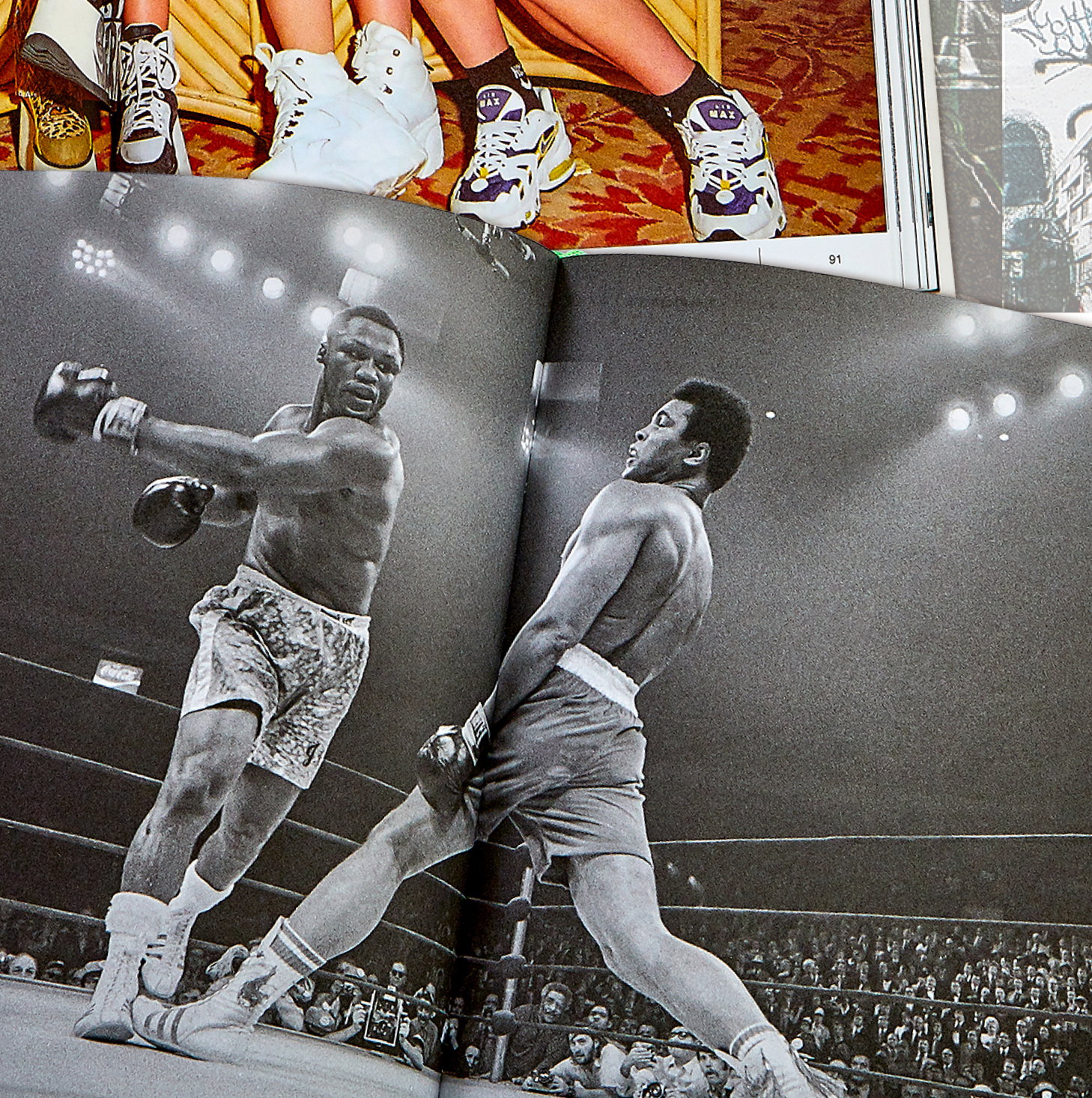 Interior pages featuring boxer Muhammad Ali.