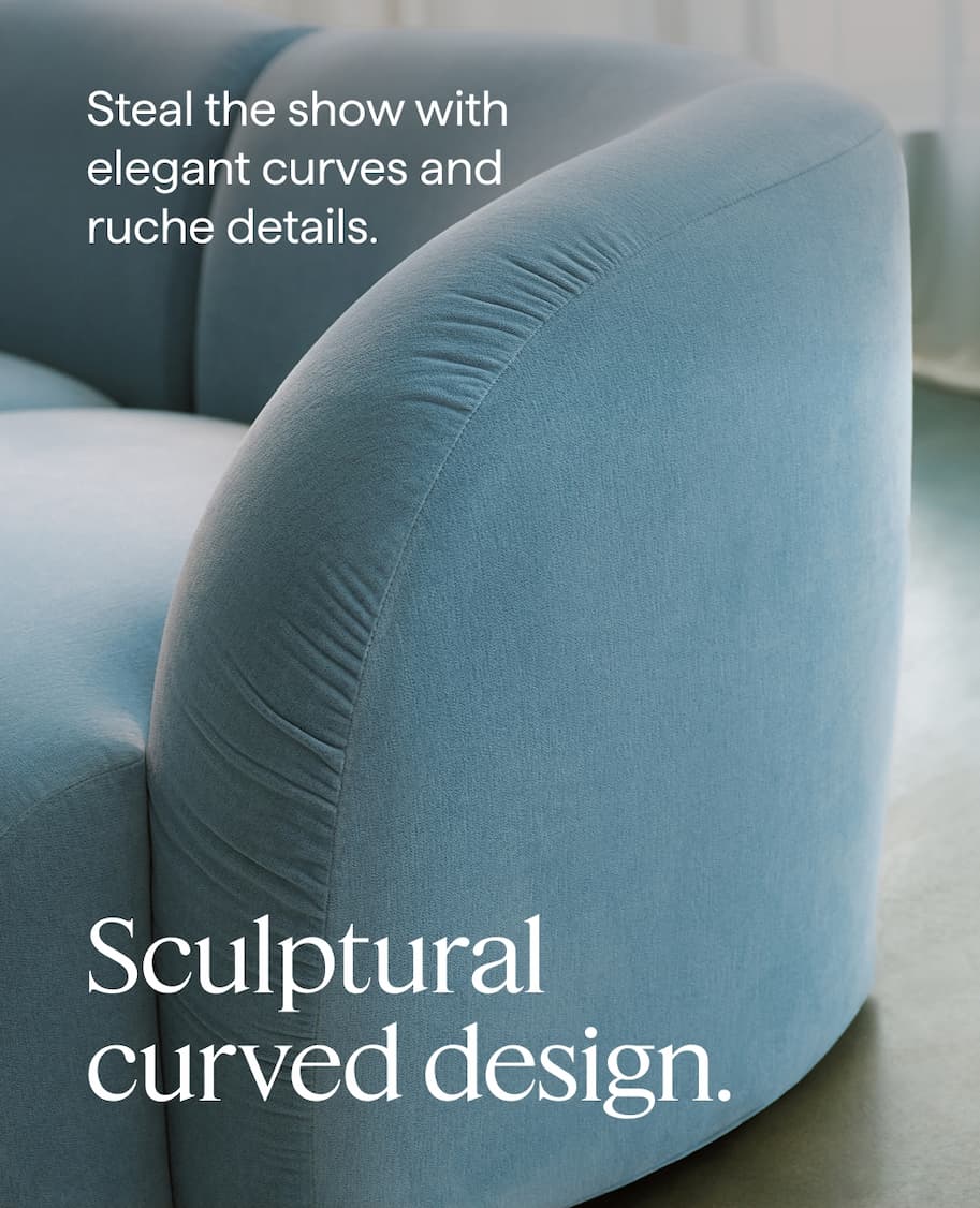 Sculptural curved design. Steal the show with elegant curves and ruche details.