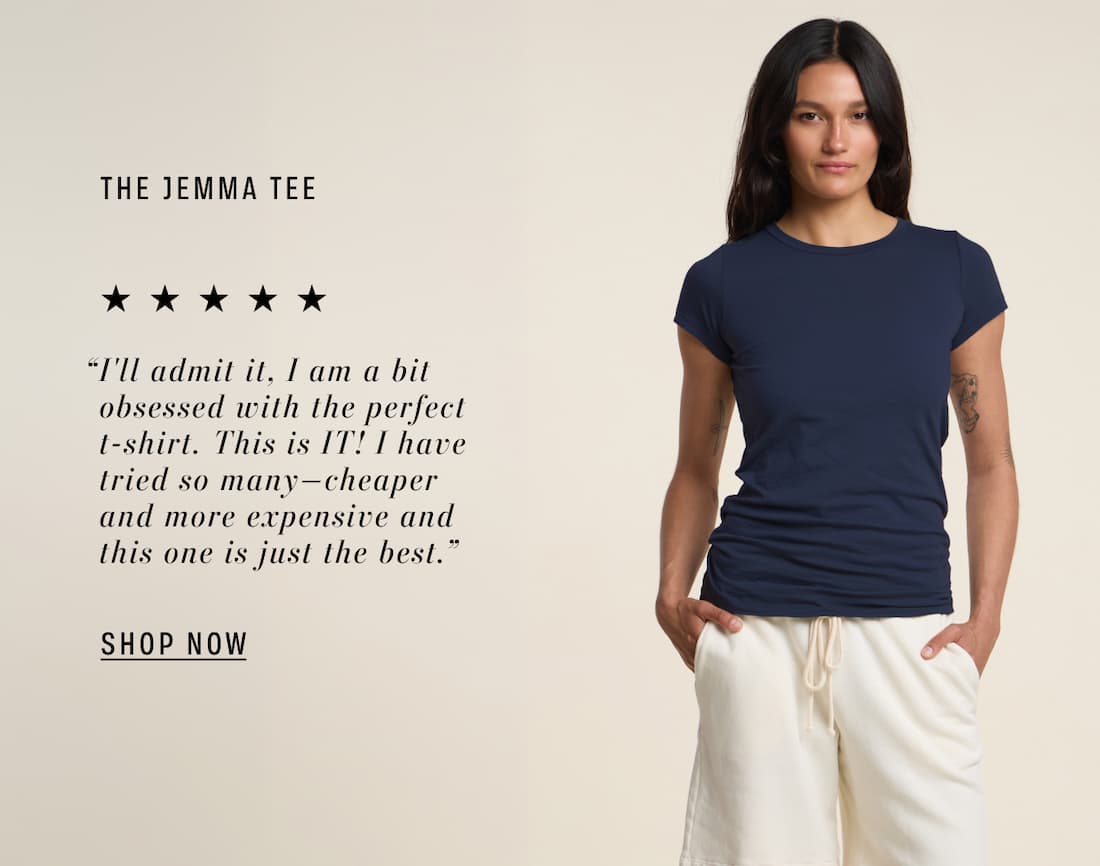 Image shows a model wearing the Jemma Tee in Navy. Text reads: The Gemma Tee. “I'll admit it, I am a bit obsessed with the perfect t-shirt. This is IT! I have tried so many---cheaper and more expensive and this one is just the best.”