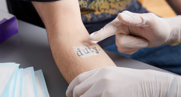 Erase Unwanted Ink w/ First Tattoo Removal Service Upto <100 sq. inch