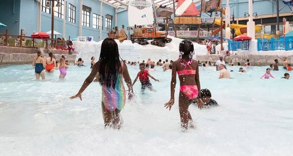 Make Waves at Aquatopia Indoor Waterpark with Admission for One