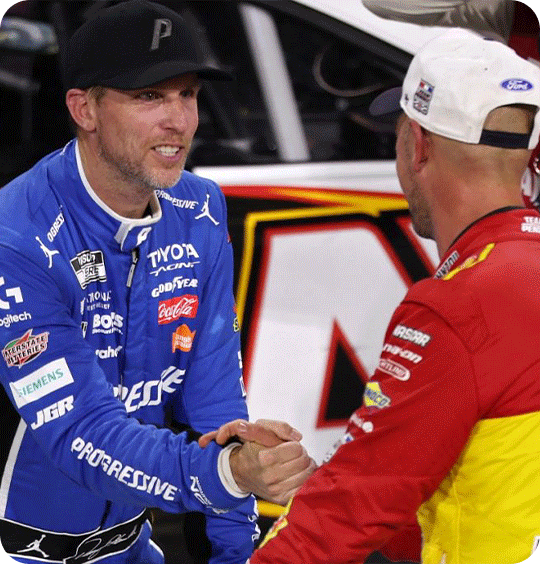 Denny Hamlin shaking hands with Joey Logano