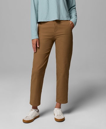 A woman wearing brown pants