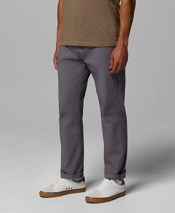 A man wearing gray pants