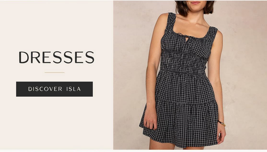 Model wearing a black-and-white plaid mini dress beside text reading “Dresses” and “Discover Isla.”
