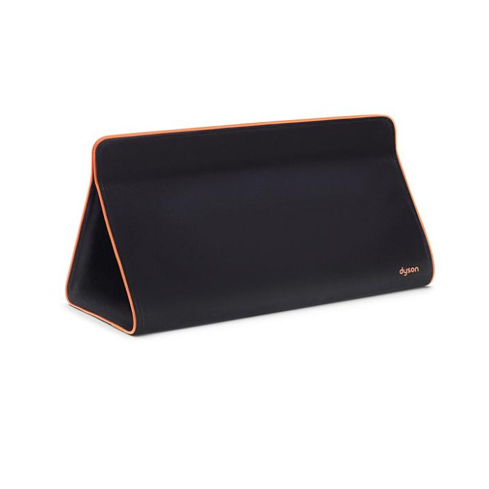 Estuche de almacenamiento Dyson en negro y cobre.