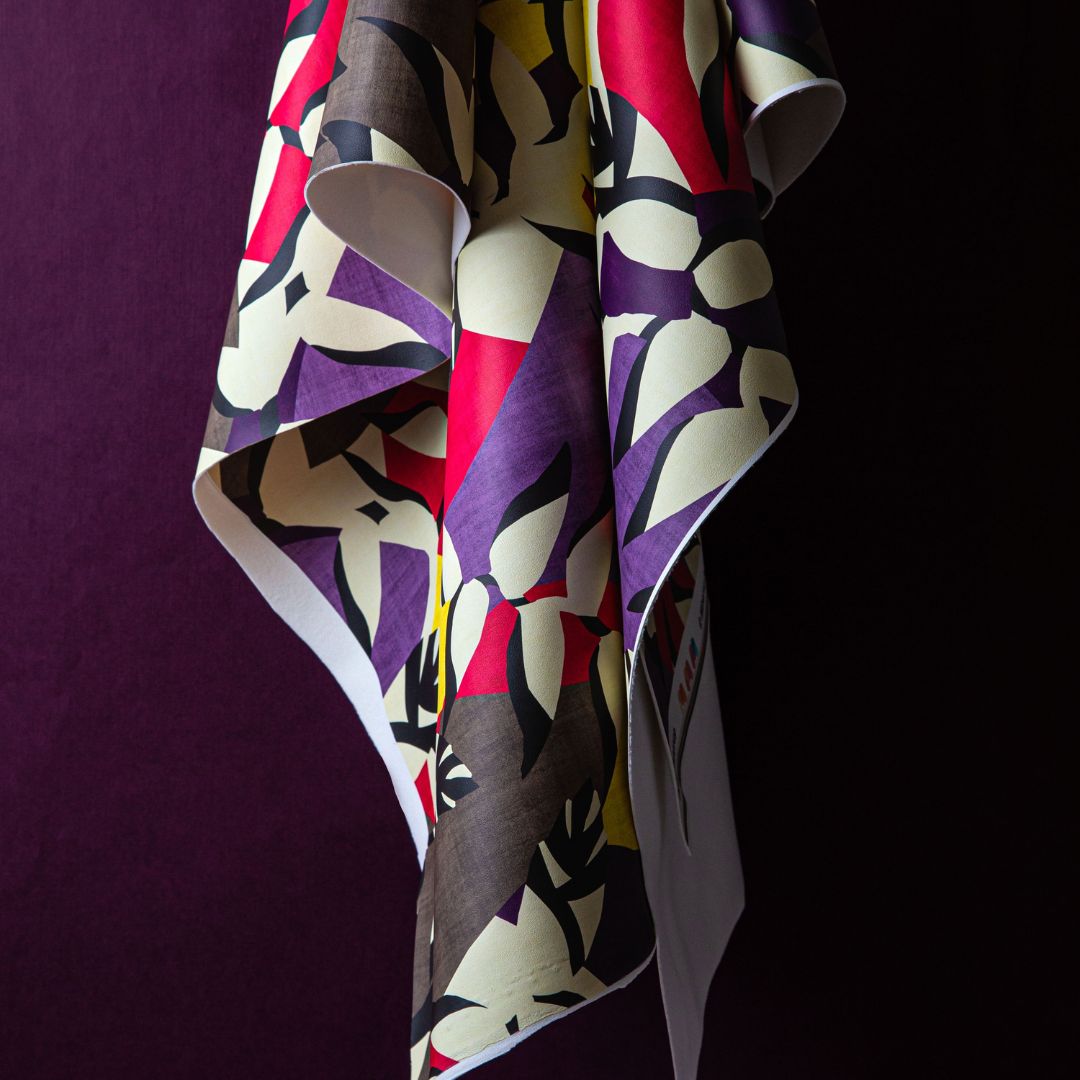 Minerva Exclusive Heliconia Halls Faux Leather POD Fabric Violet