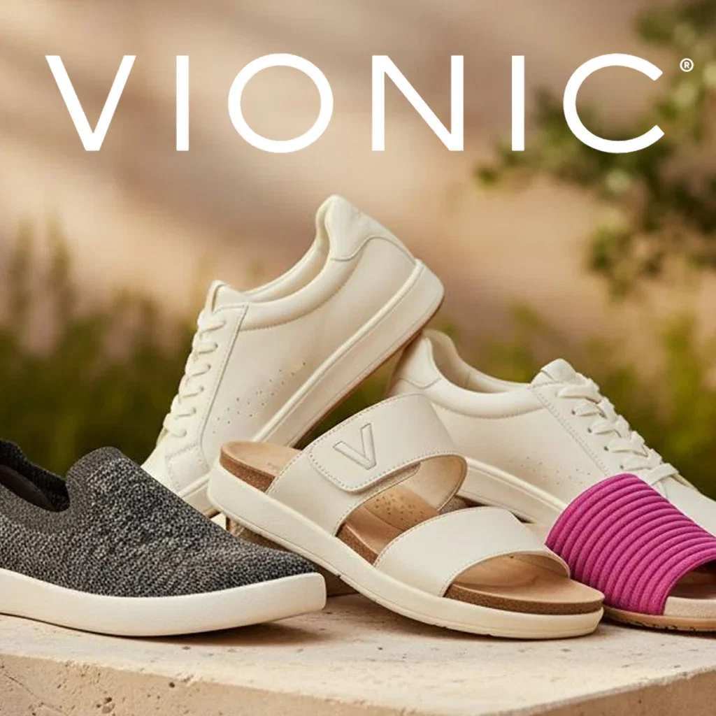 Vionic most-loved footwear collection featuring white sneakers, black slip-on, and pink sandal on neutral background