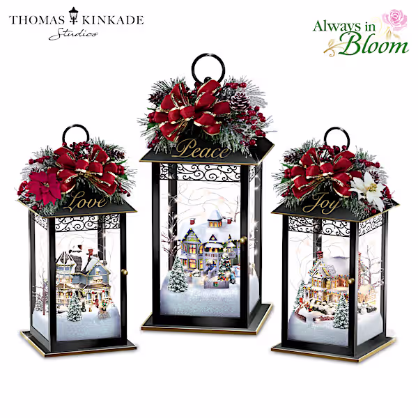 Lighted lanterns showcasing Thomas Kinkade holiday scenes