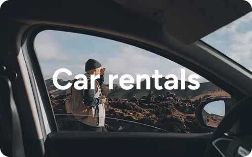 View of person walking through a car window