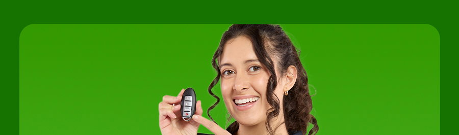Image of Batteries Plus employee holding key fob