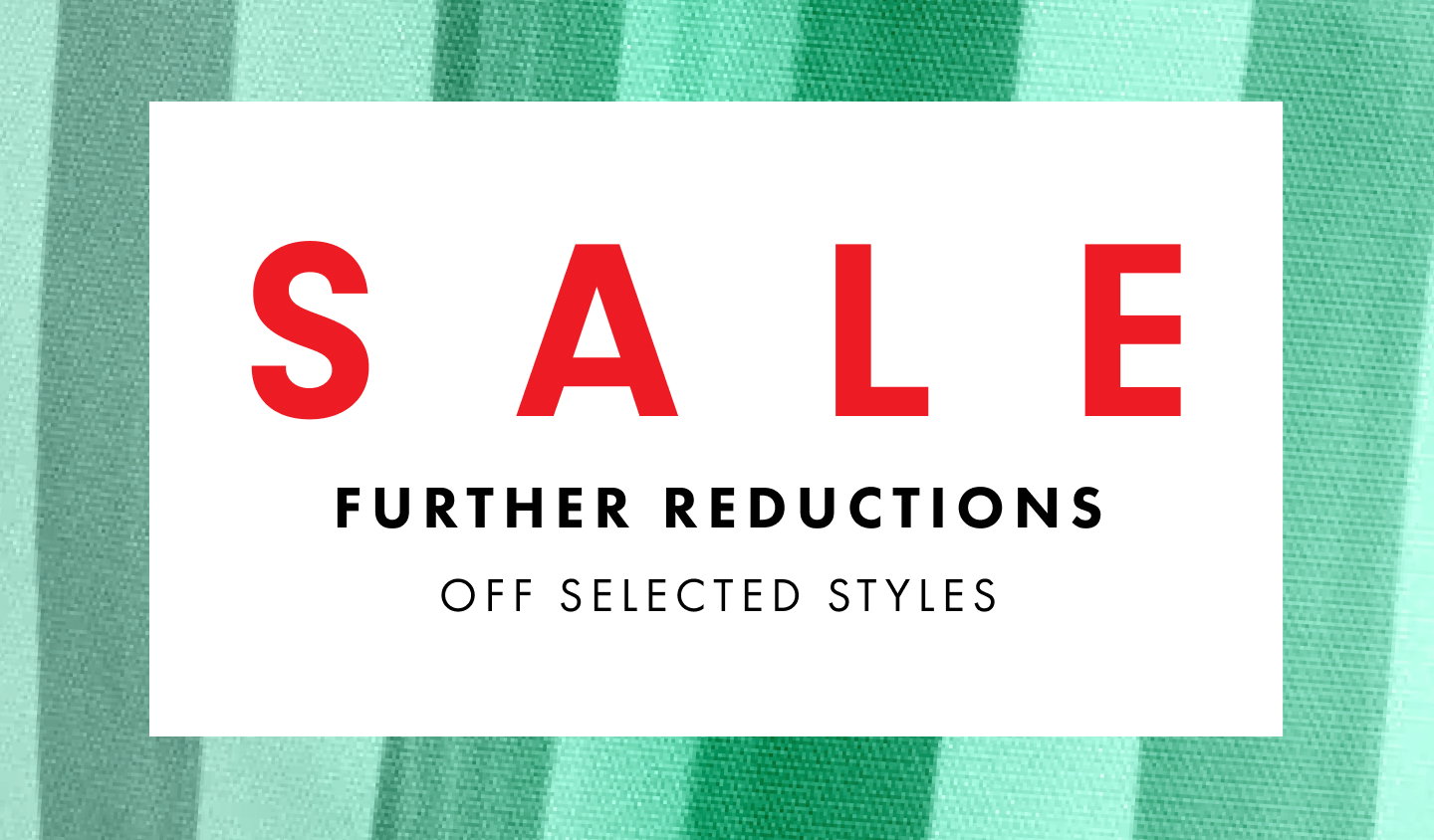 Sale Further Reductions Off Selected Styles,  on a green striped fabric background