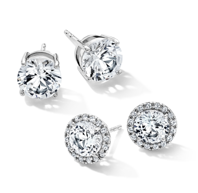 White gold diamond stud earrings in solitaire and halo designs.