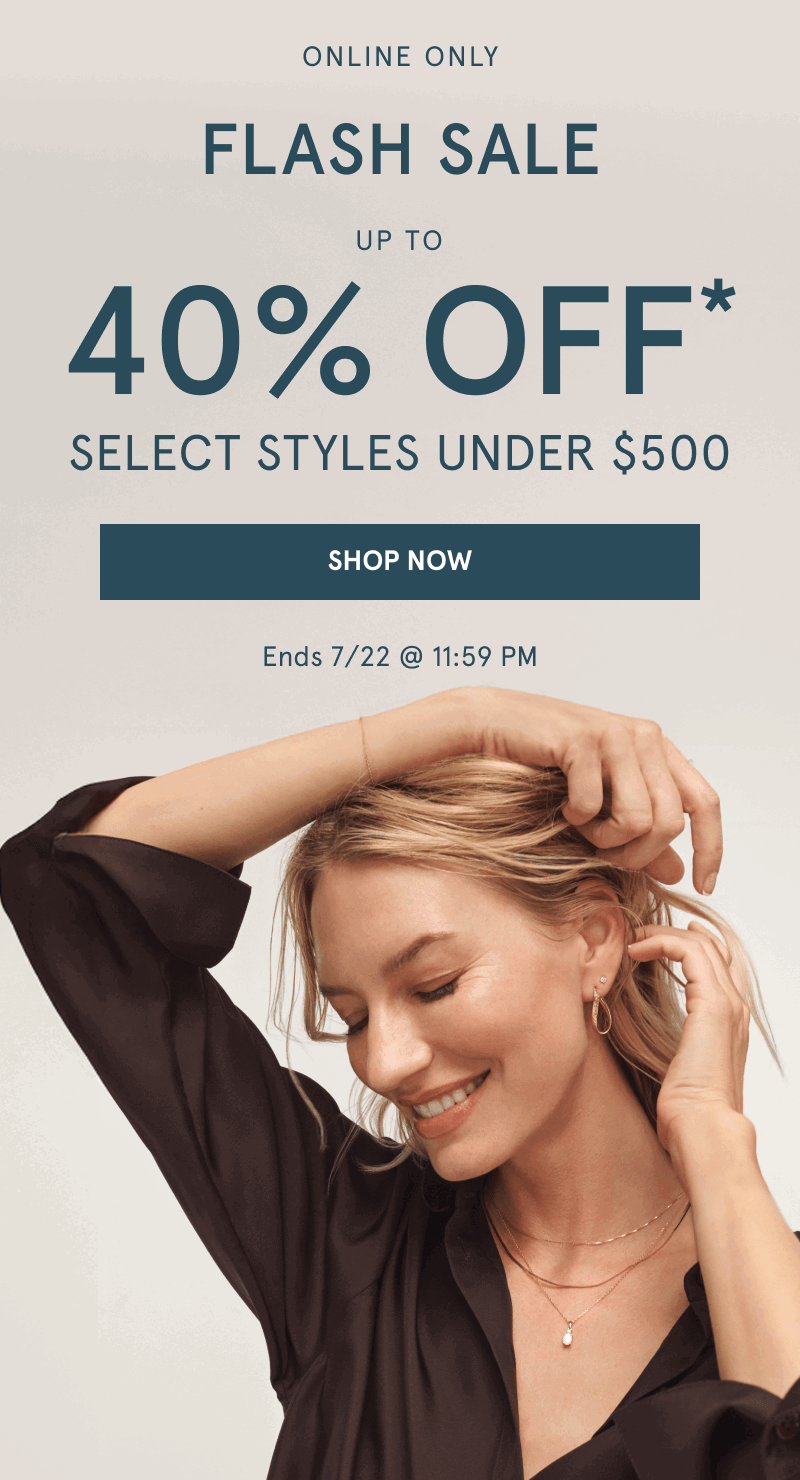 Woman in layered yellow gold chains, bracelet and earrings. Flash sale up to 40% Off select styles under $500. Click shop now.
