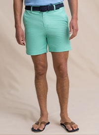 Man in green performance shorts.
