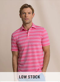 Man in pink and white striped polo.