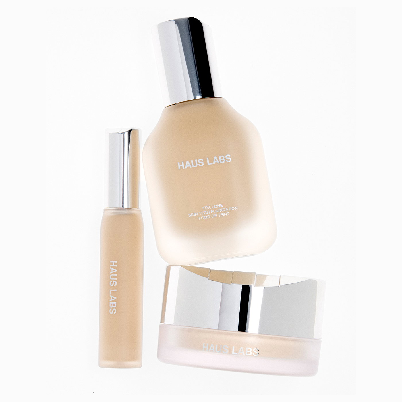 Animated graphic promoting 20% off sitewide, featuring Haus Labs Triclone Skin Tech Foundation, Atomic Shake Lip Lacquer, Triclone Skin Tech Concealer, B Structural Volumizing Mascara, Bio-Radiant Gel-Powder Highlighter, and Glassy Blush Balm.