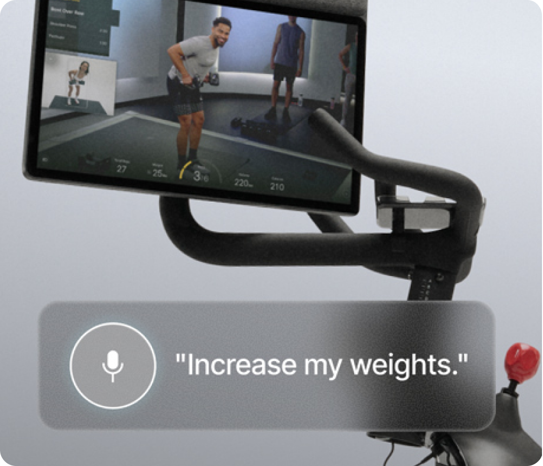 Peloton Bike+ screen demonstrating voice commands for hands-free workout control.