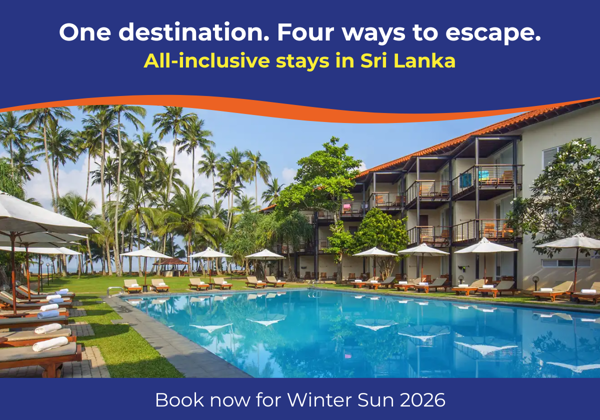 A serene pool area surrounded by palm trees and sun loungers at the Mermaid Hotel & Club.