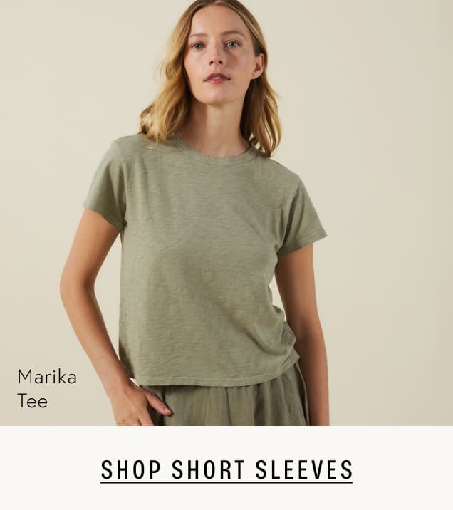 Image shows a model wearing the Marika Short Sleeve Tee in Axe.