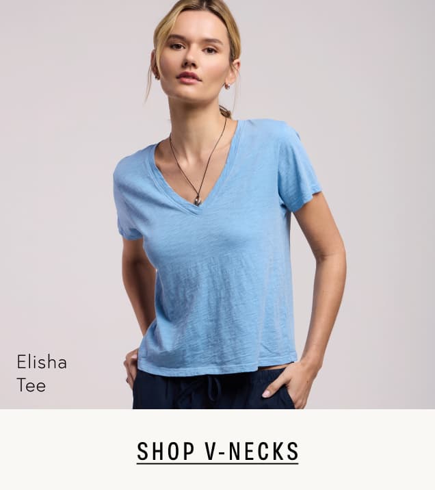 Image shows a model wearing the Elisha V-Neck Top in Pacific.