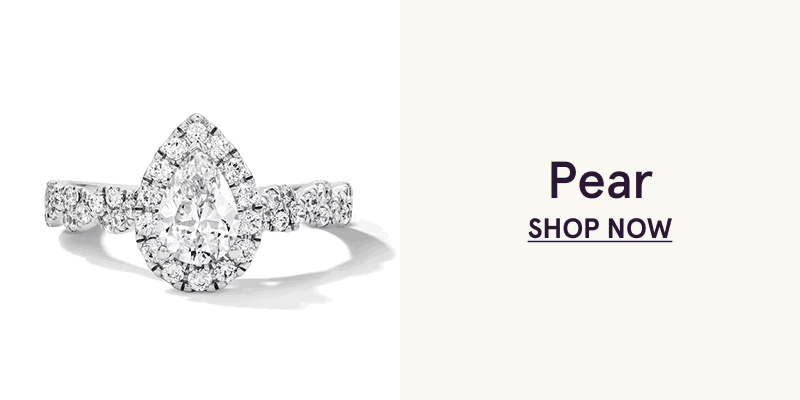 Pear-shaped stone with diamond halo & diamonds on band. Pear. Click here to shop now