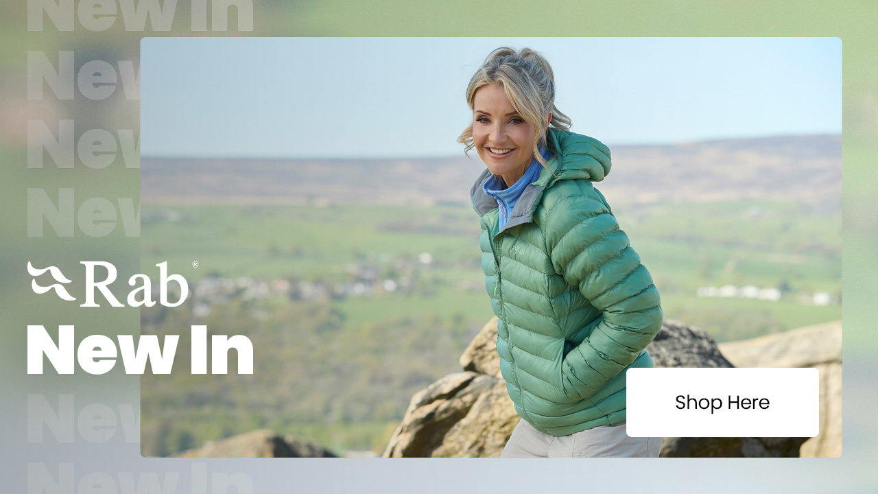 Rab New In campaign banner showing a green insulated jacket in a countryside setting with a Shop Here call-to-action.